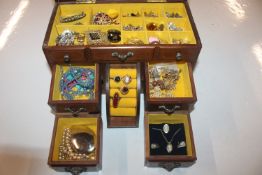 A musical jewellery chest and contents of costume