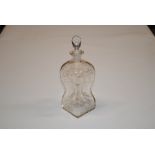 A 19th Century hour glass shaped decanter, having