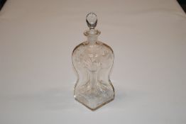 A 19th Century hour glass shaped decanter, having