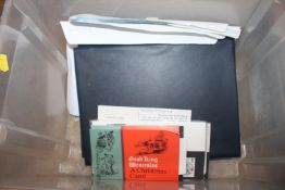 A box of stamps and First Day covers