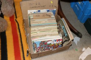 A box of Giles annuals