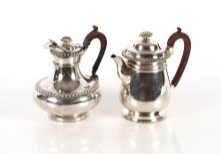 A plated coffee pot with gadrooned border decorati