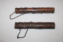 Two Chinese bronzed scroll holders with script and
