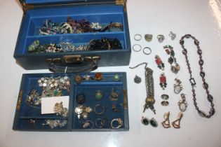 A jewellery box and contents of costume jewellery