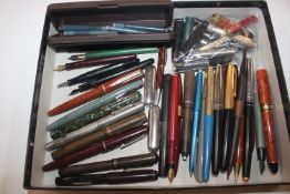 A box of assorted vintage fountain pens, some with