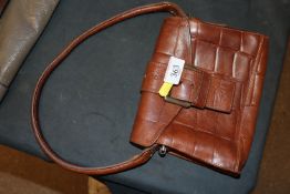 A ladies Mulberry brown leather crocodile effect handbag