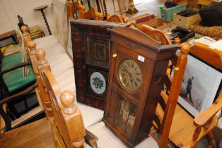 An American wall clock and an oak cased wall clock