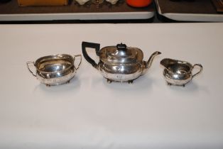 A Sheffield silver three piece tea set, approx. to
