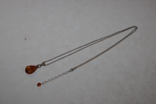 A Sterling silver amber pendant and 30" Sterling s