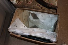 A box of unframed mirrors