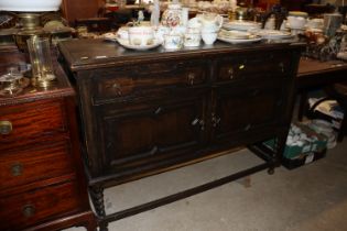 A 1930's oak sideboard