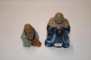 A Chinese part flambé glazed standing Buddha and a