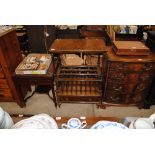 A Victorian walnut Canterbury whatnot