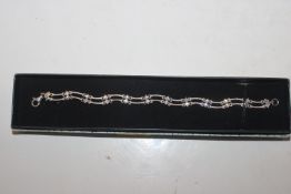 A 925 silver and white stone set bracelet