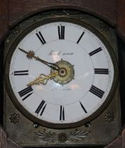 A tall French oak long case clock having circular