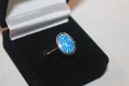 A 925 silver and blue opal set ring