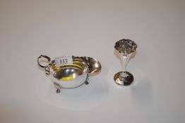 A silver sauce boat, approx. 87gms and a silver sp