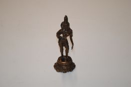 A bronzed statue of a Hindu Goddess