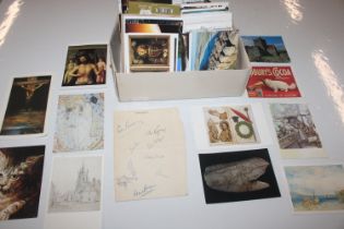 A box of various post-cards and a signed 1958 cric