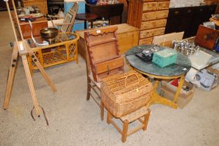 A wicker basket and contents of knitting items, st