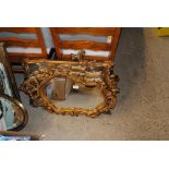 Four gilt framed decorative wall mirrors