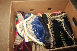 A box containing vintage ladies Asian tops, jacket
