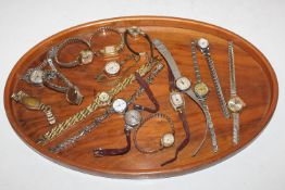 A wooden tray and a collection of vintage ladies w
