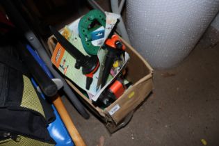 A box of gardening items to include sprinklers, ra