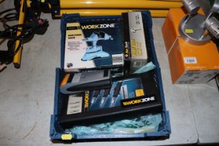 A box of tools to include vices