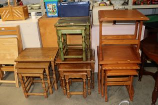 A nest of four hardwood occasional tables, two gre