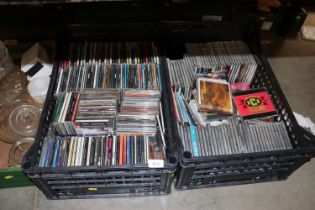 Two boxes of CDs