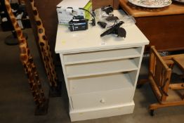 A white painted TV cabinet