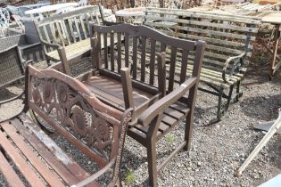 A wooden garden bench with similar table AF