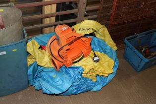 A bouncy castle with electric pump