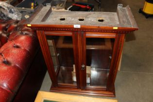 A mahogany china display cabinet