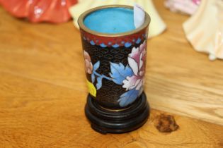 A Chinese cloisonne pot on circular hardwood stand