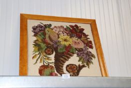 A maple framed embroidery