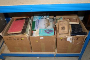 Three boxes of miscellaneous books