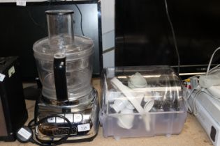 A Dualit food processor with various attachments