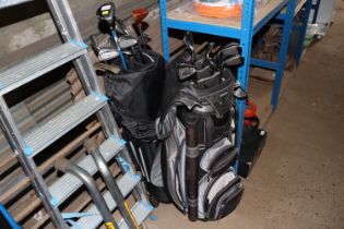 Two golf bags and clubs