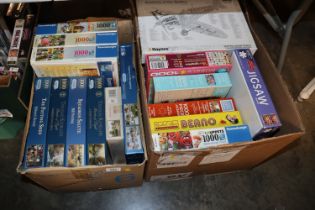 Two boxes of miscellaneous jigsaw puzzles