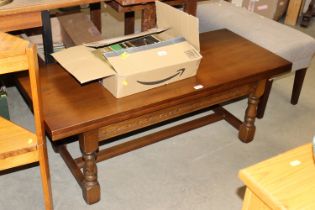 An oak fold over coffee table