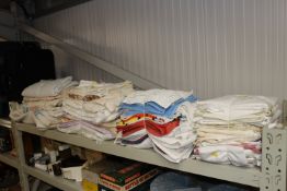 A large collection of various table napery, towels