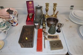 A pair of brass candlesticks, a brass skillet, var