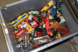 A box of various diecast toys