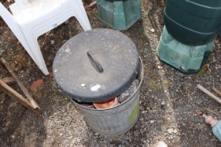 A galvanized bin and contents of various terracott