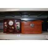 A travelling toilet case and a trinket cabinet wit