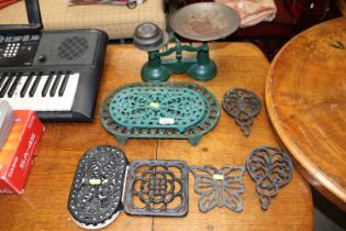 Various cast iron table stands and a set of cast i