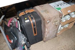 A vintage suitcase and one other suitcase