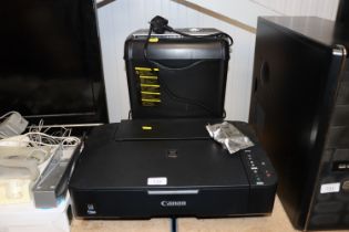 An Amazon paper shredder and a Canon copier